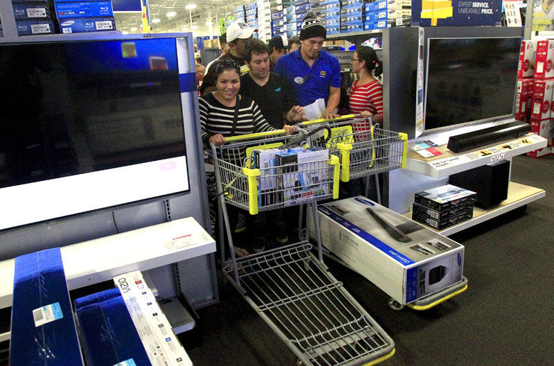 Shoppers buying TVs